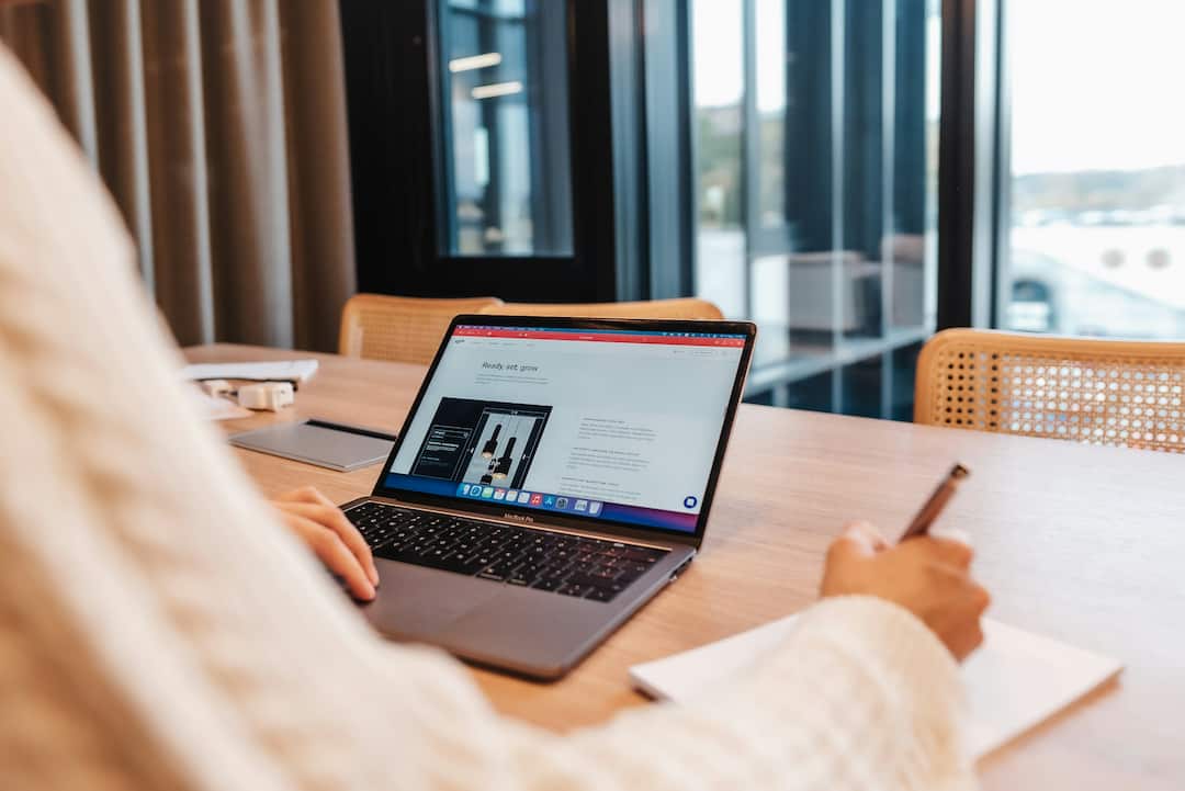 person using laptop